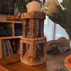 Carved wooden candle holder